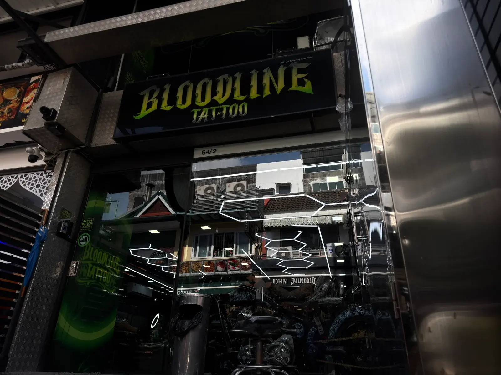 Bloodline Tattoo Phuket studio exterior on the street with signage visible