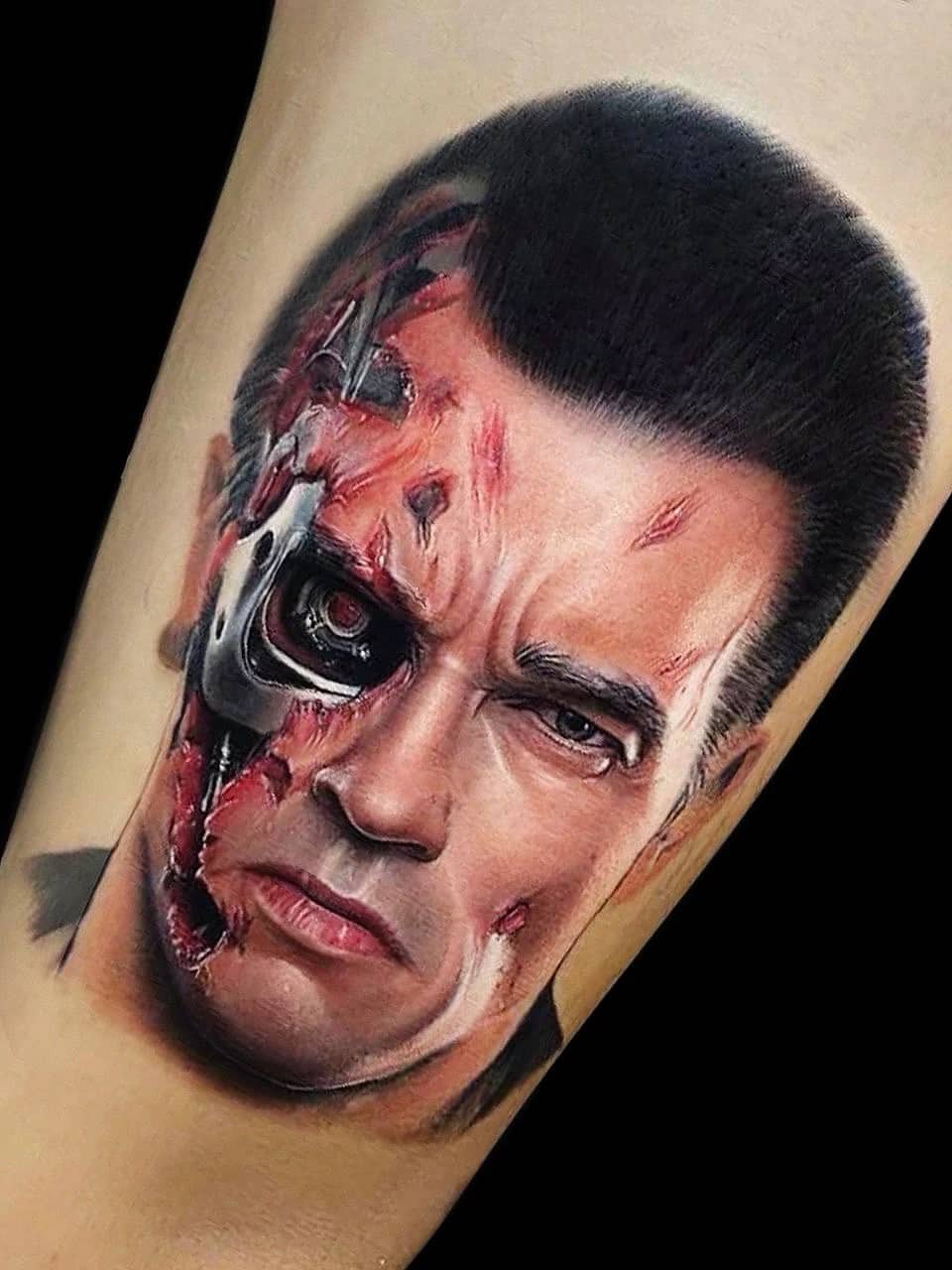Colour realism Terminator portrait with metallic endoskeleton and red eye at Bloodline Tattoo Phuket