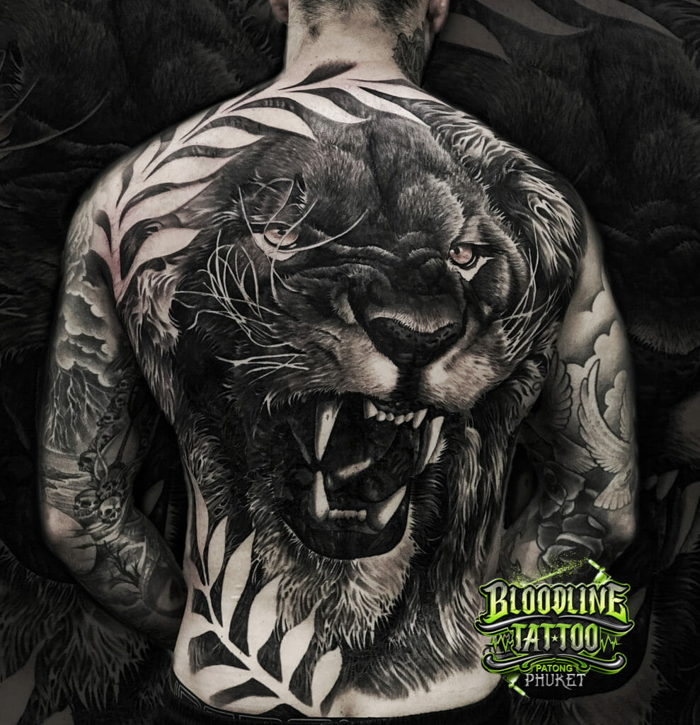 Lion Back Realistic Tattoo Design